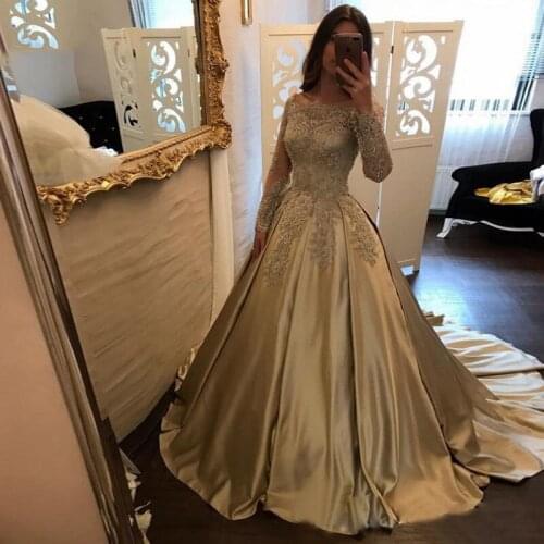Long Sleeves A-Line Boat Neck Gold Satin Evening Dresses 2020 Appliques Beading Formal Dress Prom Party Gowns Robe Soiree