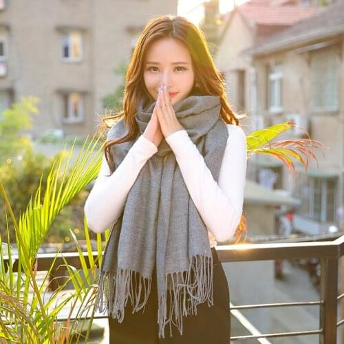 Mingjiebihuo Like the star style new fashion simple and generous thick long section wild Korean shawl students thick warm