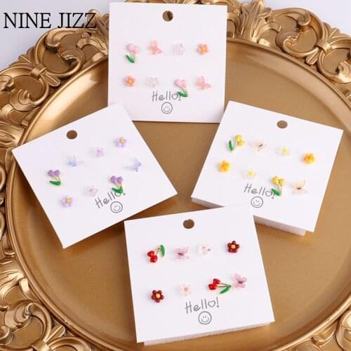 NINE JIZZ Stud Earrings