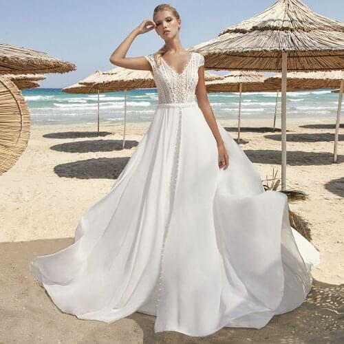 2021 Boho Beach A-Line Cap Sleeve Lace Appliques Wedding Dress V-neck Court Train Sexy Backless Bridal Gowns