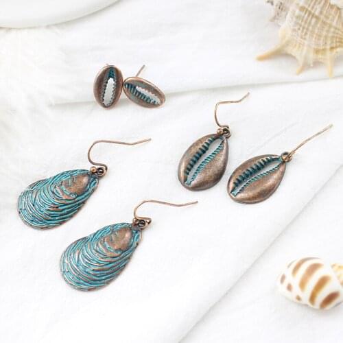 Metal alloy ocean style earring Shell shape drop earrings A great jewellery accessory for a wave vacation Female gift