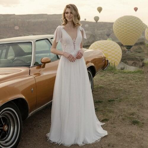 Elegant Backless Tulle Wedding Dresses 2021 Boho Beach V-neck Wedding Gowns Sleeveless Open Back Simple Bride Gown White Ivory