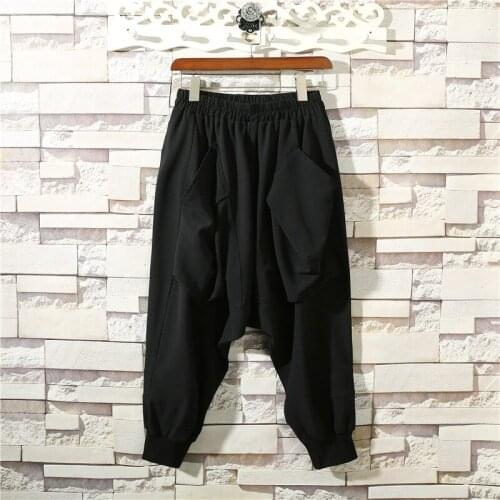 Spring and summer mens new solid color elastic waist special pocket design loose low-grade Harun pants nine points radish pants