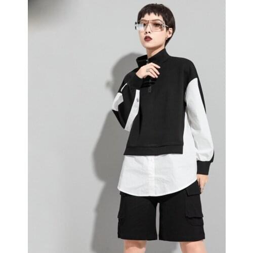 Lady spring and autumn new style individual character splice is false two loose recreational long sleeve T shirt