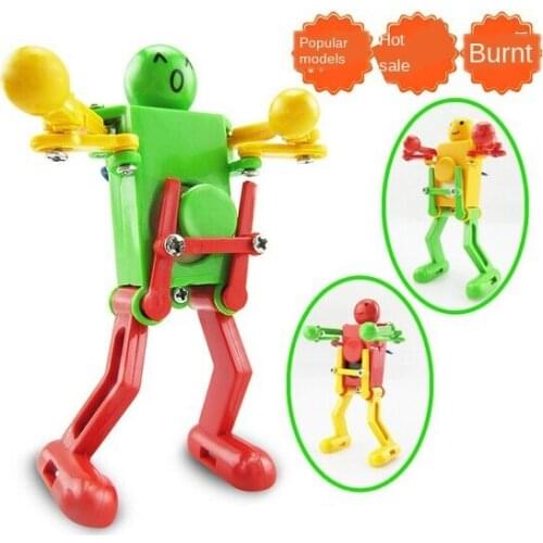 New Ideas on the Chain Asynchronously Clockwork Dancing Butt Robot Toy Childrens Educational Toys Hot Sale