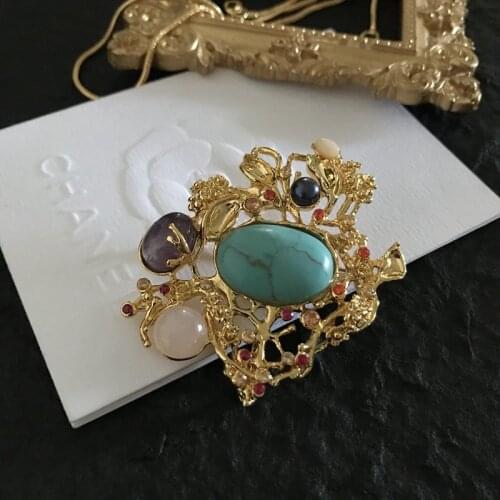 European and American jewelry medieval palace style natural turquoise crystal hollow brooch for women