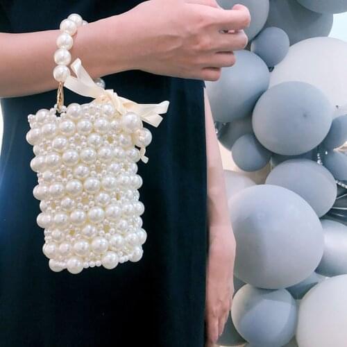 2021 New Elegant Hand Woven Beaded Evening Clutch Purses Female Small Bucket HandBagsWomen Luxury Hollow Out Pearl Bags Bolsos
