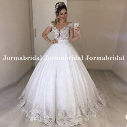Appliques Lace White Wedding Gowns Cap Sleeves Sparkly Bling Tulle Ball Gown Backless Wedding Dress Customized Bridal Dresses