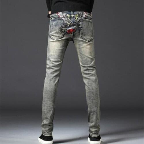 Mens Jeans New European and American Style Mens Elastic Embroidery Small Foot Jeans Contracted Fashion Worn White Slim Pants