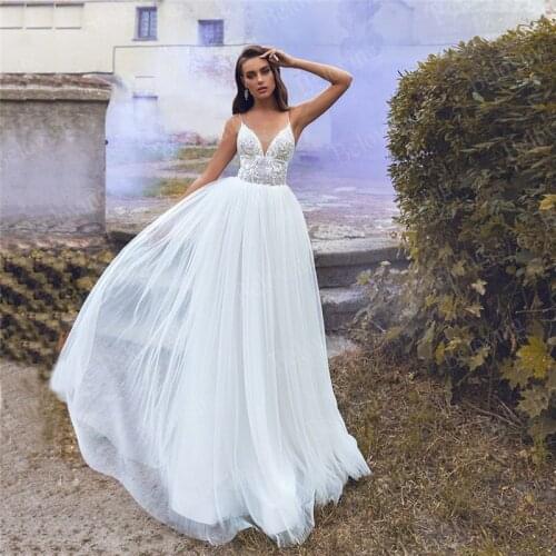 Sexy Beach Illusion Wedding Dresses V neck Vestido De Noiva Spaghetti Straps Pleats Lace Appliques Backless Bridal Dresses 2021
