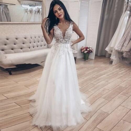 Boho Wedding Dresses Deep V-neck Appliques Long Bride Dress Backless Princess Wedding Party Gowns robe de mariee 2020