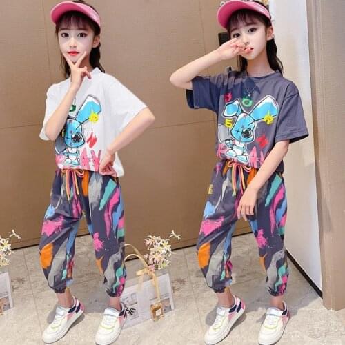 Girls' summer suits big children 2021 short-sleeved tops + nine-point pants sports suits two-piece cartoon graffiti for children