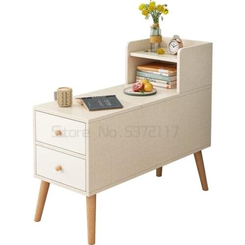 The side cabinet next to the tea table in the living room and the side cabinet next to the sofa