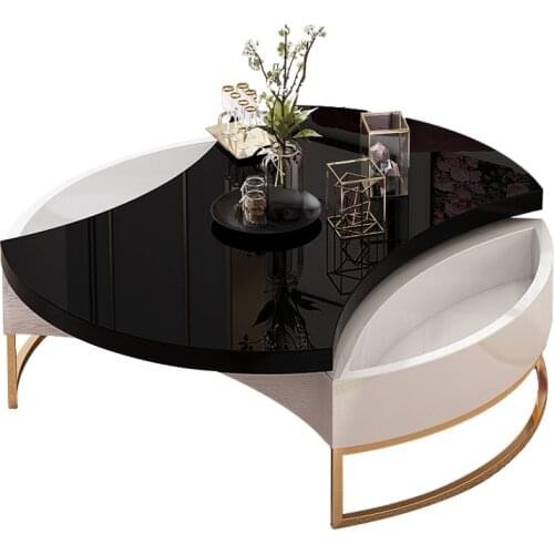 Full Mu light luxury post-modern circular creative rotatable deformation coffee table Nordic living room net red simple table