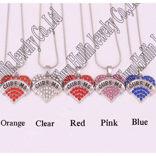 Best-Selling rhodium plated zinc studded with sparkling crystals CURE MS heart pendant necklace