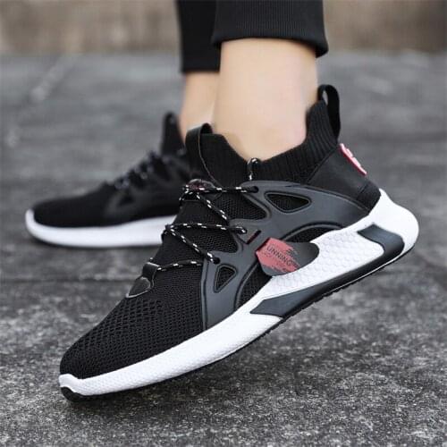 Flying woven sports shoes mens Korean fashion casual shoes running shoes 2021 new mens shoes spring