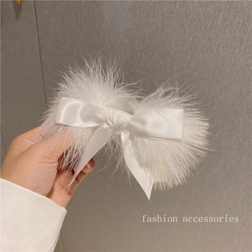 Autumn and winter Korean version of white feather hairpin fairy wind duck clip word clip girl sweet temperament gentle wind clip