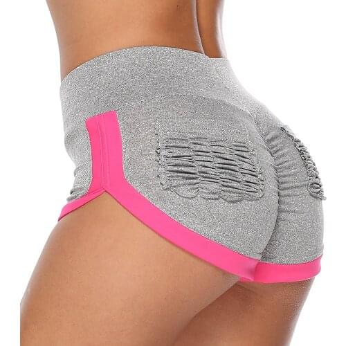 Quick-drying fitness abdomen sports tights sexy hip pocket stitching gym sweat-absorbent leisure sports fitness shorts