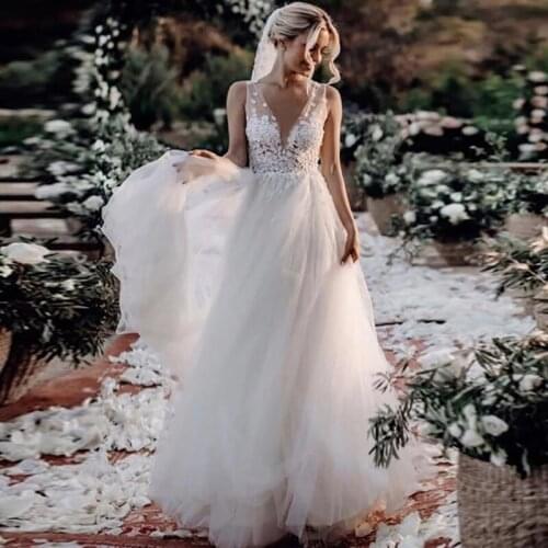 Bohemian Wedding Dresses Sexy Deep V Neck Sheer Tulle 3D Floral Appliques Open Backless A Line Boho Bridal Gown Vestido De Noiva