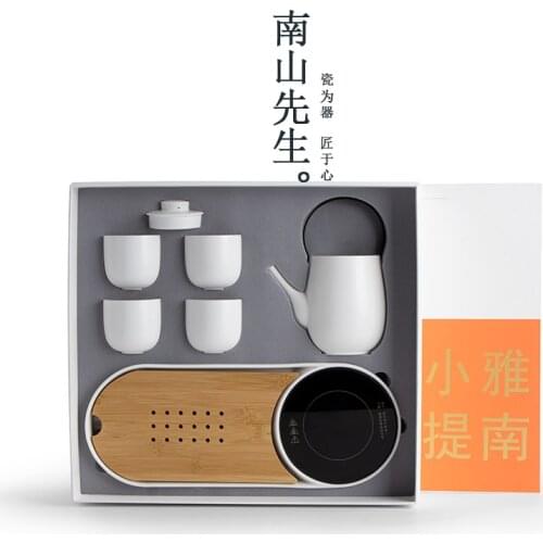 Porcelain Tea Set With Warmer Travel Kung Fu Tea Set Aesthetic Decorations Tea Ceremony Tetera Porcelana Teaware Sets BG50TS