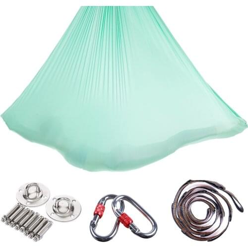 Aerial yoga hammock in yoga studio, inverted home stretch belt sling, stretch widening yoga hammock