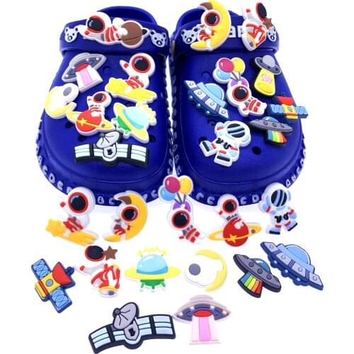 100PCS Wholesale Cartoon Astronaut Shoes Charms Croc Jibizt Decoration PVC UFO Accessories DIY On Shoe X-mas Children Presents