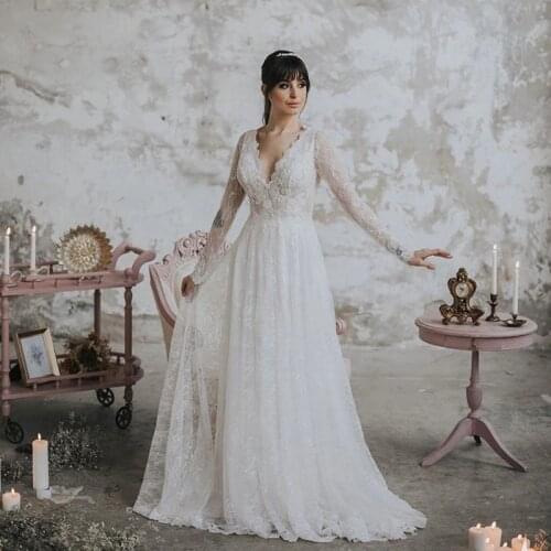 Charming Hot Sale Lace Wedding Dresses Long Sleeves Wedding Gowns Ivory V Neckline Bridal Dresses Cut Out Back Sweep Train 2021