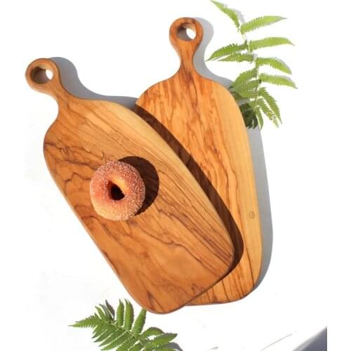 Cutting boards bread sushi pizza steak lamb chops food plates trays dishes storage olive wood chopping board block