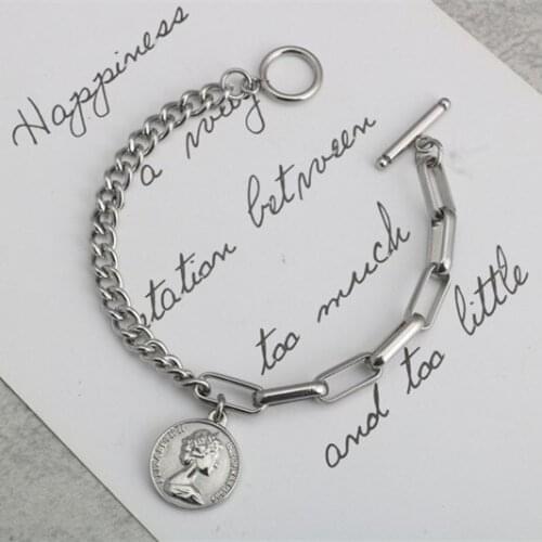 Fashion word buckle female round titanium steel OT buckle men and women bracelet hot sale