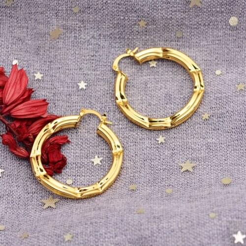 Africa Dubai Gold Color Earring For Women Ethiopia jewelry wholesale Twist in stud wave earrings distortion Flowers earrings