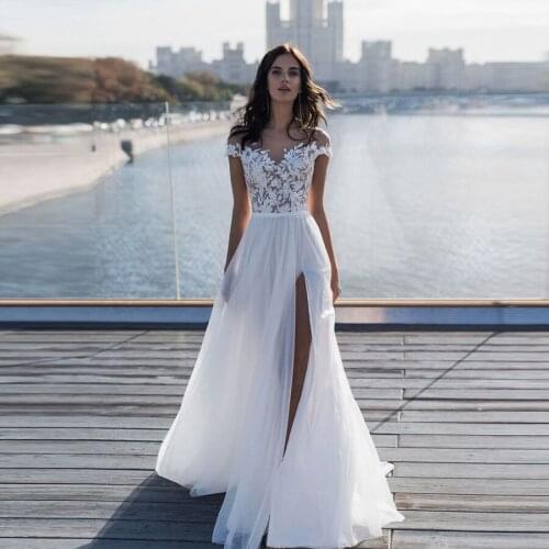 Sheer O-neck Applique Lace A-line Wedding Dress With Side High Slit Tulle Sweep Train Cap Sleeves Wedding Gowns robe de mariee
