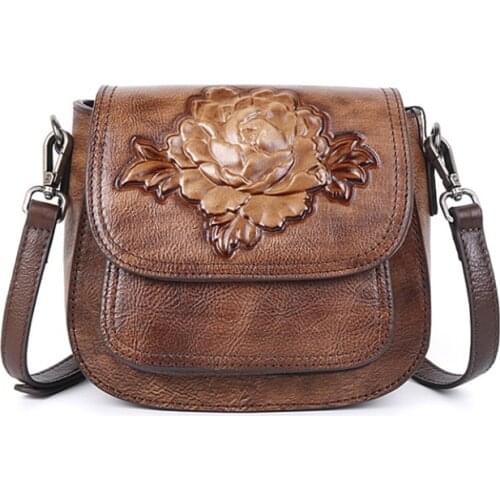 The new three-dimensional embossed head layer cowhide bag, one shoulder diagonal lady bag, hand rubbed color peony fashion bag