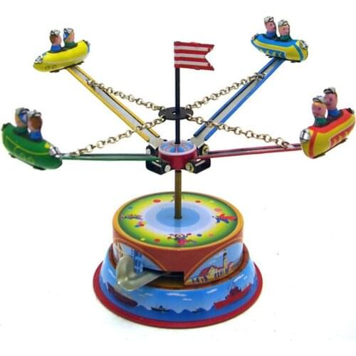 Vintage Clockwork Wind Up Rotating Spaceship toys Photography Children Kids Adult Spaceship Tin Toys Classic Toy Christmas Gift