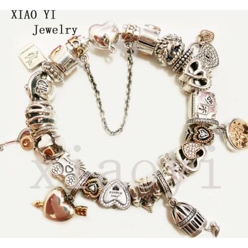 XIAOYI 2020 New 100% S925 Suitcase stroller heart arrow book Castle Tree of Life Crown key bird cage bracelet Valentine gift