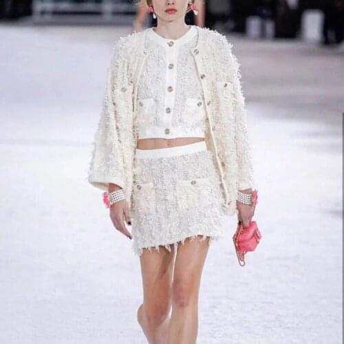 2021 Runway Knitted 2 Piece Set Women Tassel White Single Breasted Sleeveless Tank Top and Mini Bodycon Skirt Set Chic Suit Set