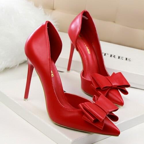 Korean version of bowknot high heels shallow mouth pointed side empty super high heel womens singles