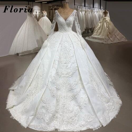 Dubai Couture Feather Wedding Dresses Heavy Pearls Beaded Bridal Gowns Long Sleeves Arabic Wedding Bride Dress 2021 Custom Made