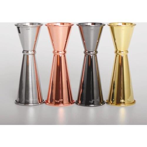 Stainless steel wine measuring device with scales inside and outside