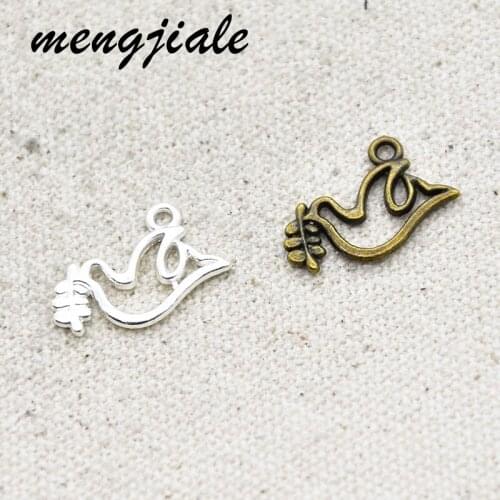Hot sell 50pcs metal bright silver Peace Pigeon charms Pendant for Crafts Jewelry Making Accessories