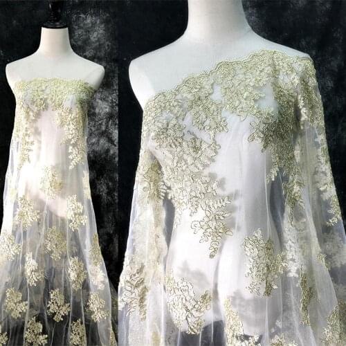 Champagne gold heavy embroidery cloth dress skirt dress hard lace mesh embroidery perspective designer fabric