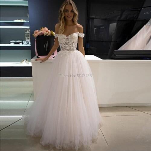 Sexy Off The Shoulder Lace Applique Wedding Dresses with Cap Sleeves 2021 Romantic 3D Flowers Wedding Bridal Gown Floor Length