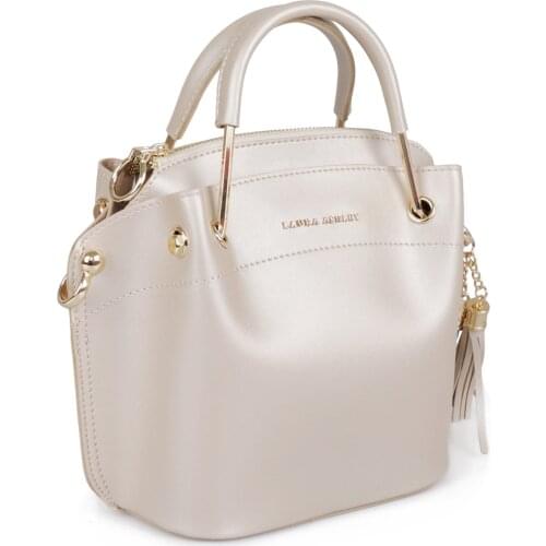 Womens Tassel Detail Shoulder Bag One zipper piece 3 main compartment is available. Zipper and magnet closure featuring