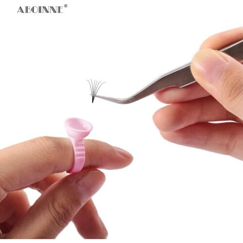 Abonnie 100pcs Disposable Glue Holder Ring Cups for Eyelashes Extension Holder Pallet Adhesive Glue Holder