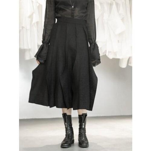 Autumn and winter womens new pure color wide edge pleat waist wool fabric skirt fashion light cooked skirt seven minutes