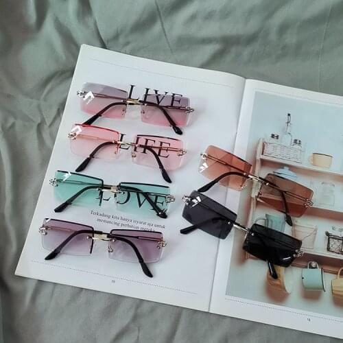 Fashion ultralight small lens sunglasses female trimming frameless temperament color transparent gentle small frame sunglasses