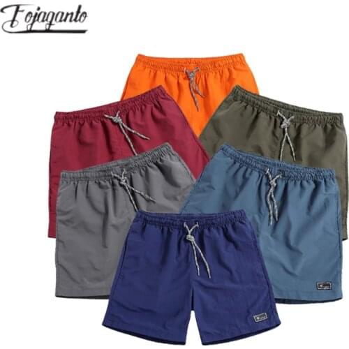 FOJAGANTO 2021 Summer Men Quick Dry Shorts Casual Pockets Solid Color Sport Shorts Breathable Classic Beach Shorts Man