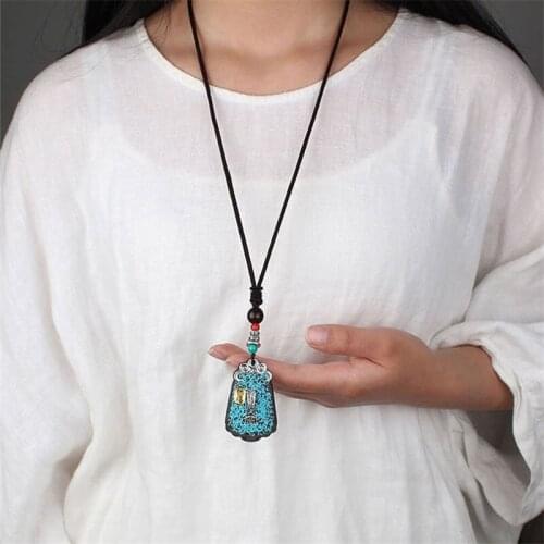 Ebony handmade Nepal evil spirits nine palace gossip national wind sweater chain pendant necklace