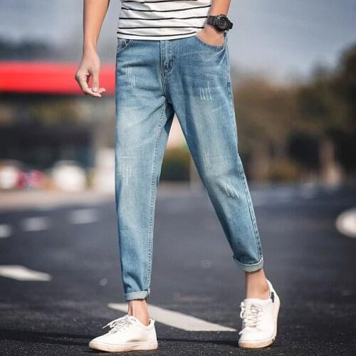 New Spring and autumn long jeans Youth Korean version of the trend of wild Light Distressed mens nine Jeans Pencil Pants K004