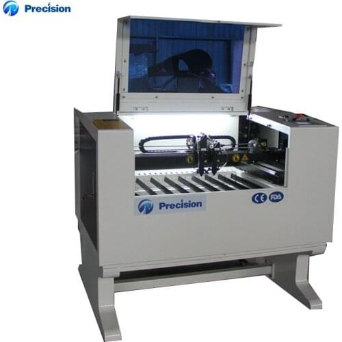 Best price JP6040 high speed portable double head CO2 mini laser machine for sale