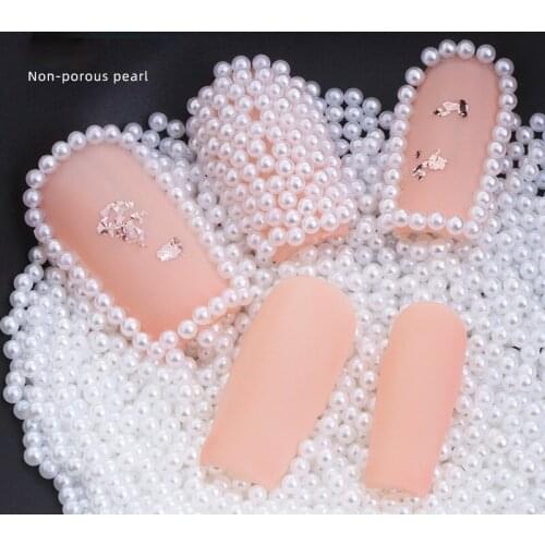 High-quality ABS artificial pearls DIY handmade loose beads semi-round pearl rice bead jewelry non-porous pearl small bag wholes